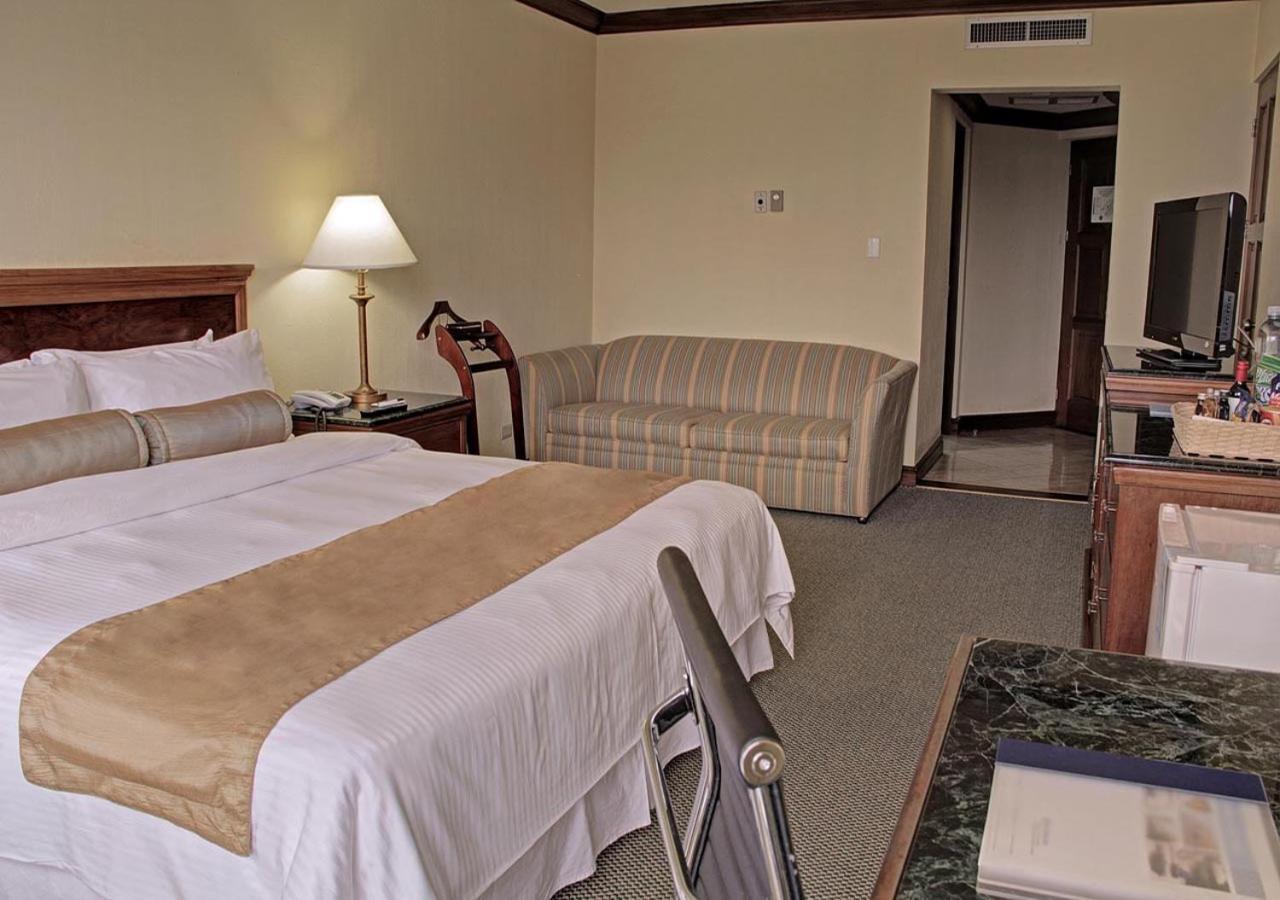 Wyndham San Jose Herradura Ngoại thất bức ảnh A room at the hotel
