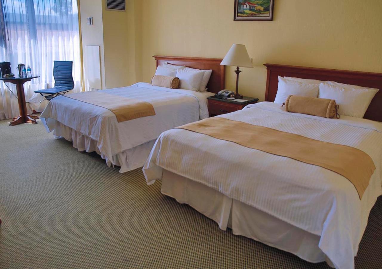 Wyndham San Jose Herradura Ngoại thất bức ảnh A room at the hotel